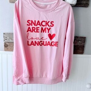 Pink Sweatshirt with Red Text